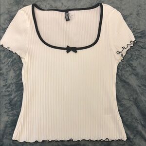 Elegant White Ribbed Top with Black Trim